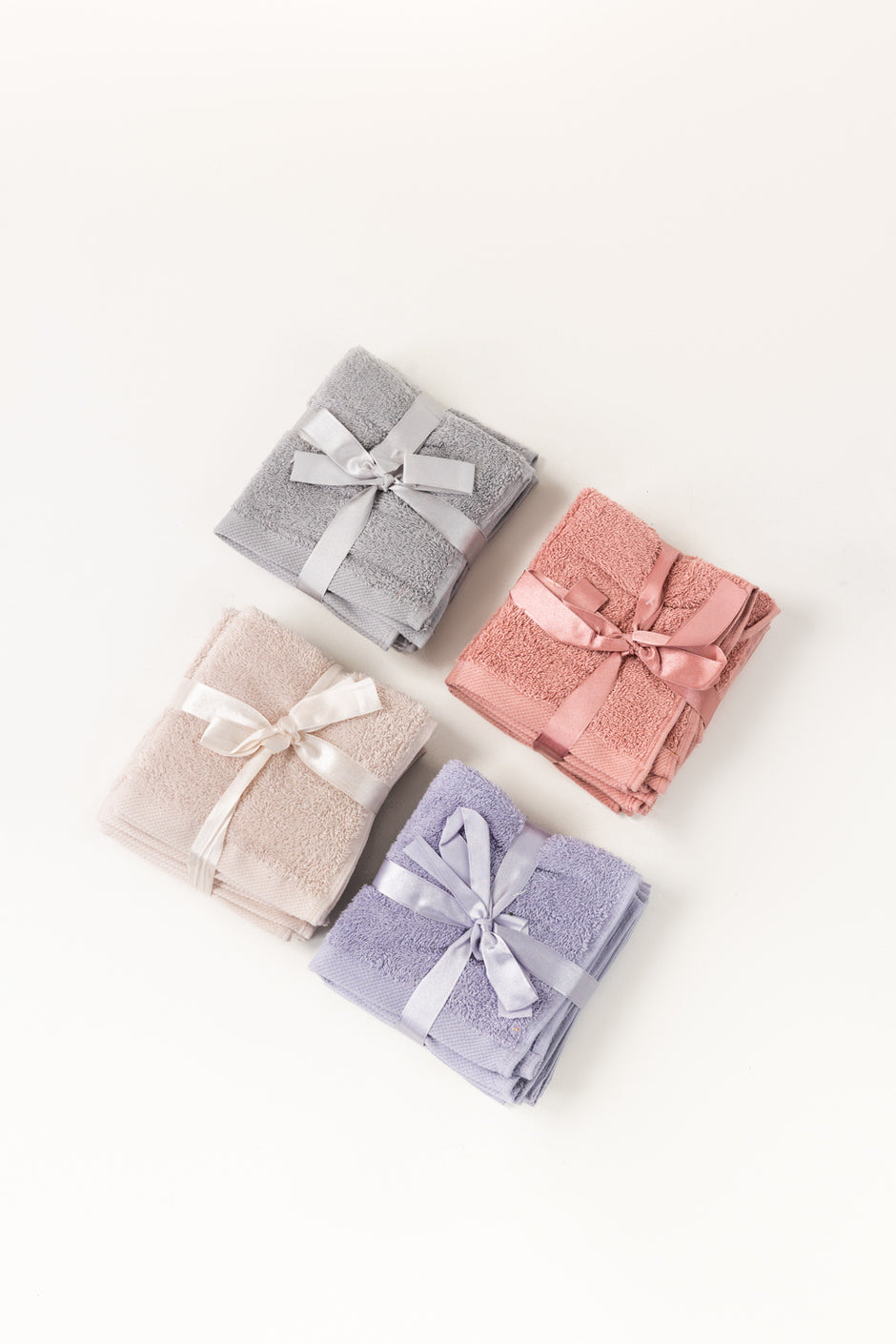 Pink Dust 4 Pcs Combed Face Towel Set